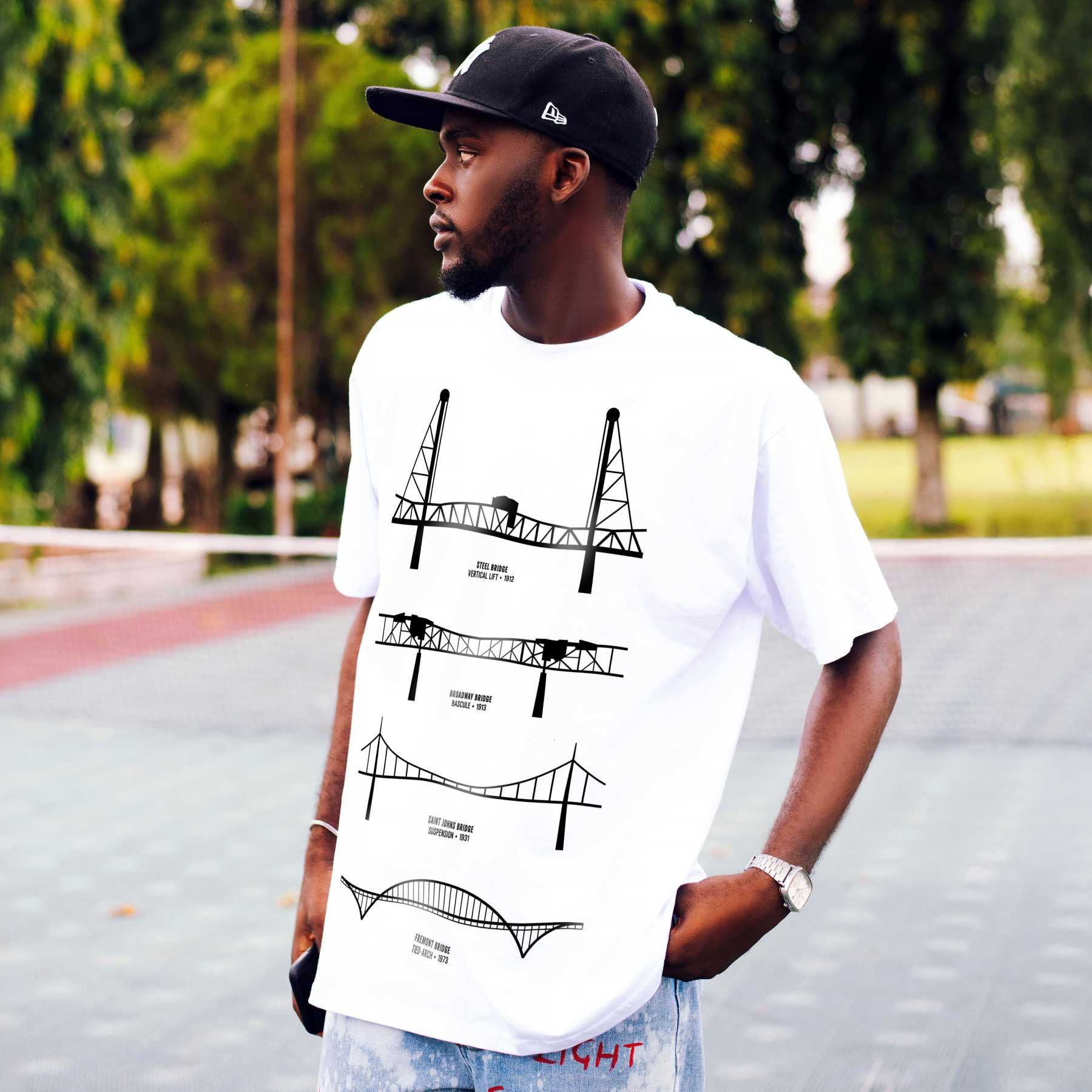 Rose City Roots Portland graphic tee — black on white worn by model wearing black hat