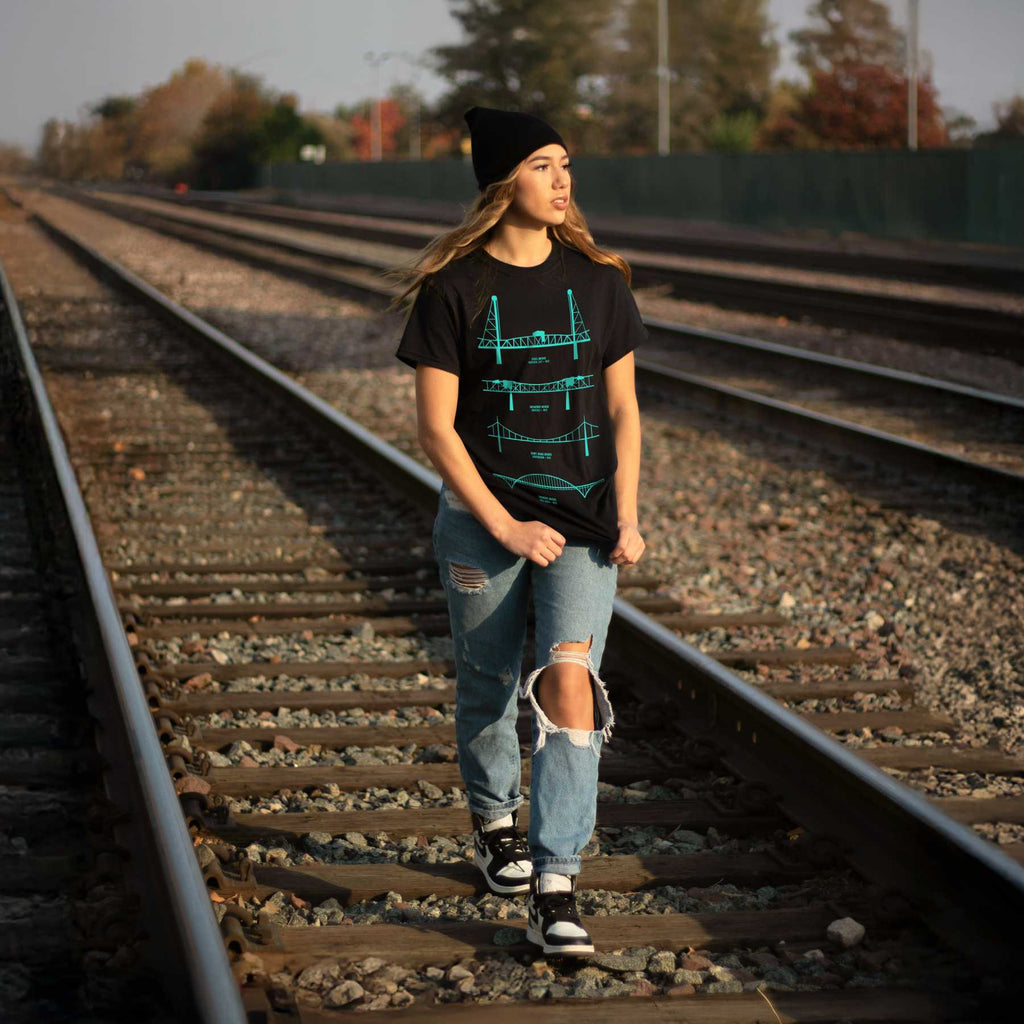 Terminal Teal PDX Portland graphic tee — PDX airport teal colorway on model