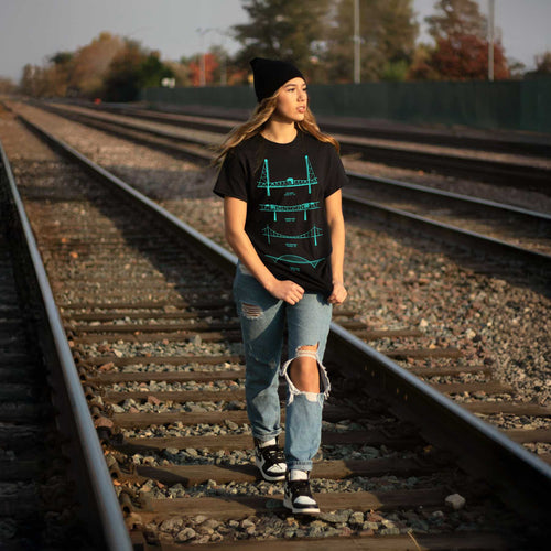Terminal Teal PDX Portland graphic tee — PDX airport teal colorway on model